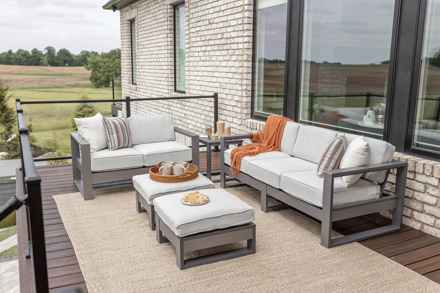 Nordic Collection Amish-Made Outdoor Poly Furniture with Sofa, Loveseat, Ottomans, and End Table with Graphite Cushions