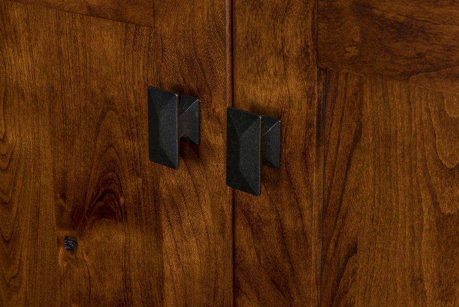 Amish bookcase door handles and wood closeup