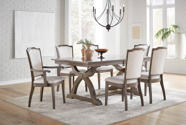 Carmen Dining Set featuring the Carmen table with black finish and Palmer chairs in a bright dining room setting.