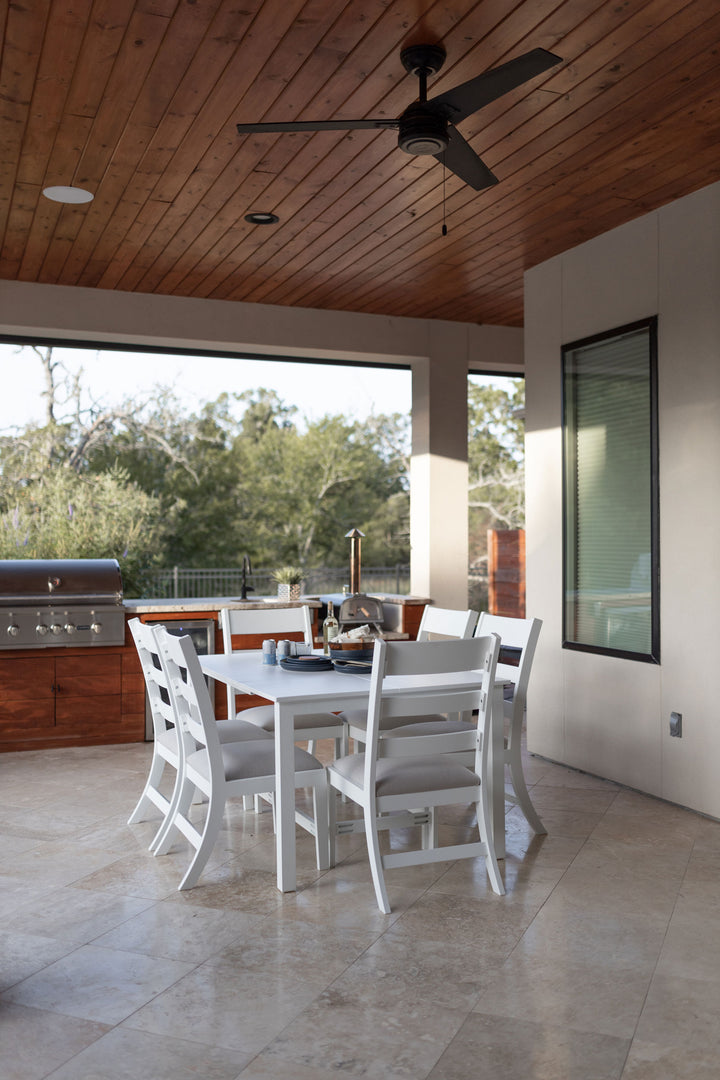 White outdoor patio dining furniture set by Herron's Amish Furniture, spacious and stylish for backyard gatherings.