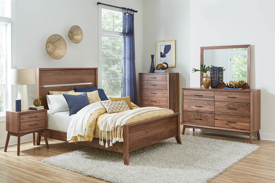 A beautifully handcrafted Tucson hardwood bedroom set from Herron's Amish Furniture, featuring a modern mid-century design with elegant wood tones.