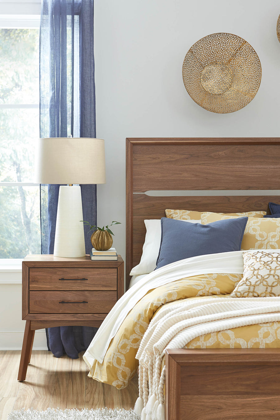 A detailed look at the Tucson bed's headboard with a sleek cutout design, highlighting its contemporary Amish-made aesthetic.